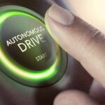 Finger,Pressing,A,Push,Button,To,Start,A,Self-driving,Car. | TechSplicit autonomous driving button
