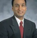 Microchip Keeps Sanghi at Helm to Steer Turnaround