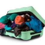 overstuffed luggage | TechSplicit Over stuffed baggage