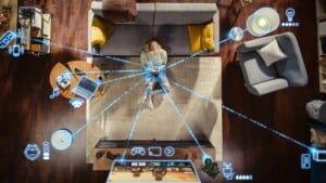 TopViewOfCaucasianWomanInTheLoftApartmentSitting | TechSplicit Connecting Smartphone to Smart Home Systems